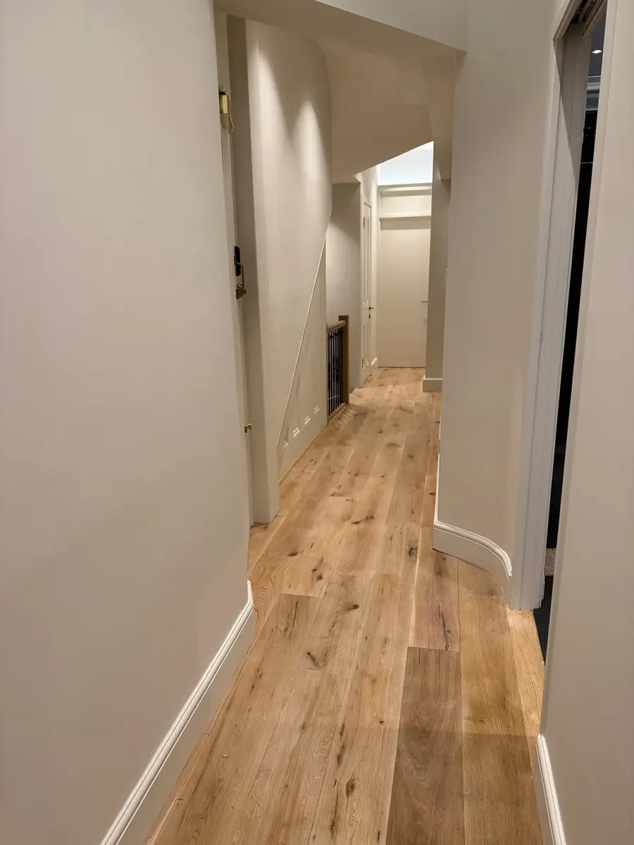 Hallway with wide engineered oak floorboards
