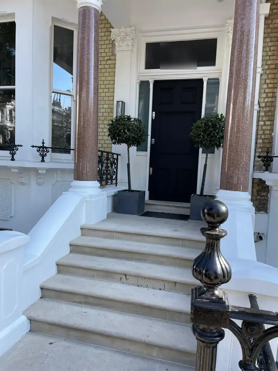 Painted stucco entrance steps of a period townhouse